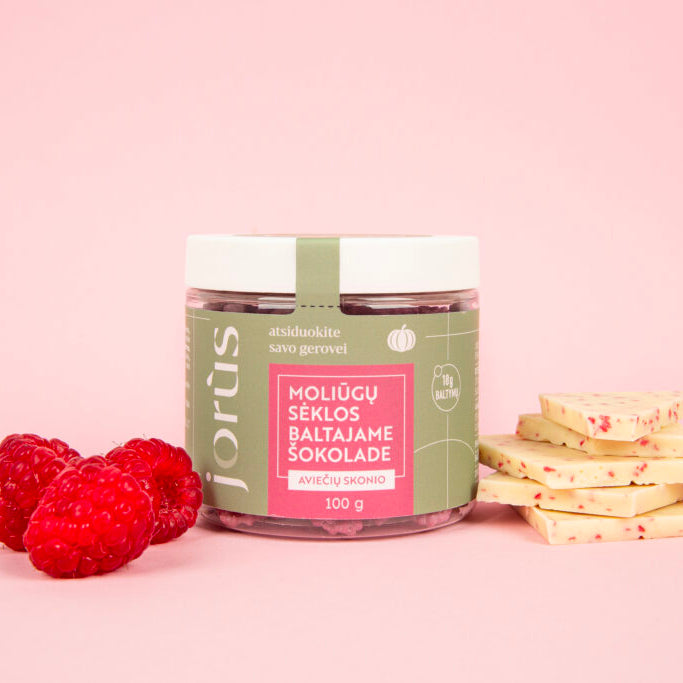 Aviečių skonio moliūgų sėklos baltajame šokolade