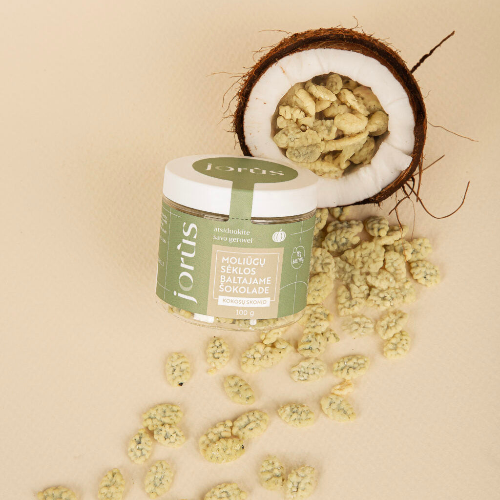 Kokosų skonio moliūgų sėklos baltajame šokolade
